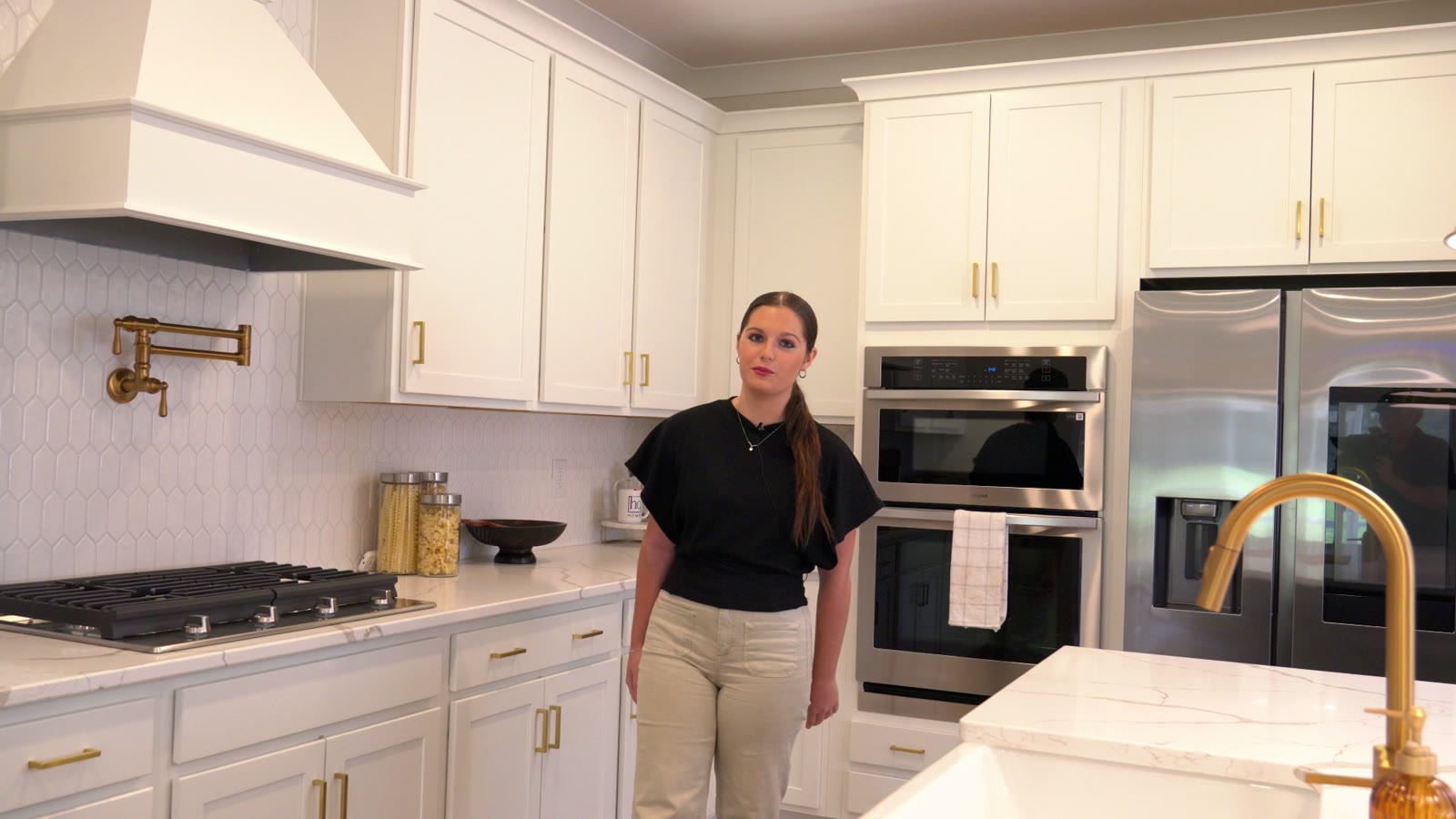 Mya in the model home kitchen