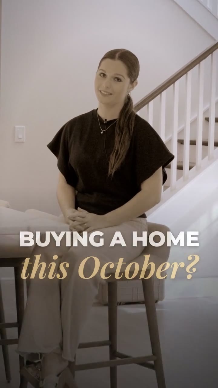 New home sales rep seated in a model home with the words Buying a home this October